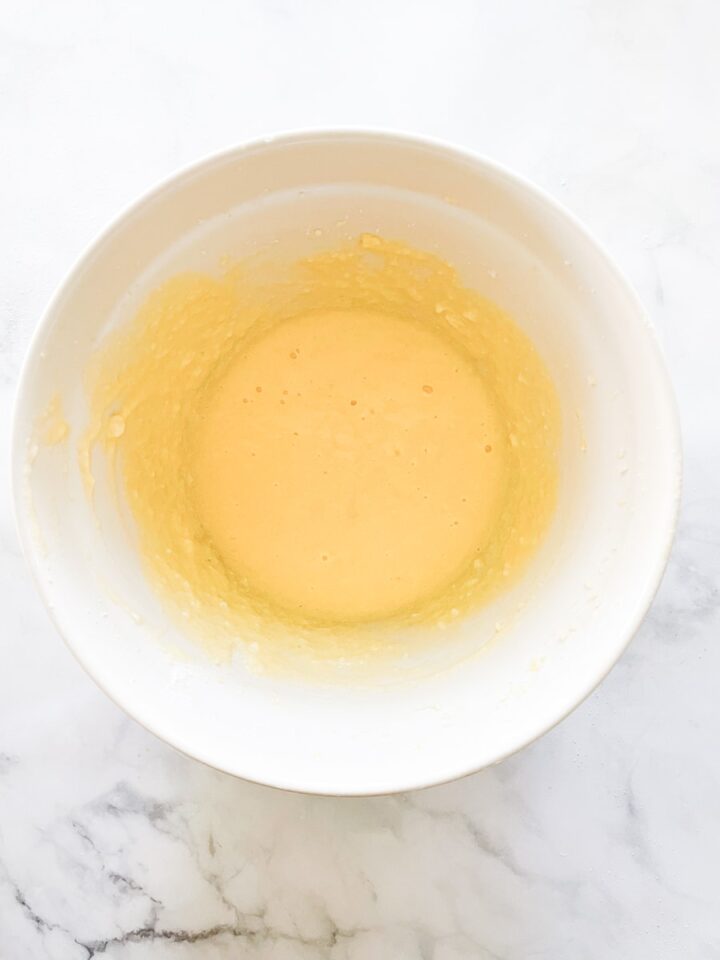 My version of Edna Lewis' Busy Day Cake is a winner - simple ingredients come together to make the most perfectly tender, lightly sweet cake. The wet mix for busy day cake in a bowl.