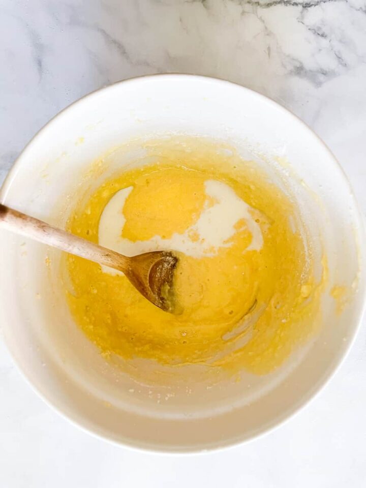 My version of Edna Lewis' Busy Day Cake is a winner - simple ingredients come together to make the most perfectly tender, lightly sweet cake. Milk is stirred into the batter.