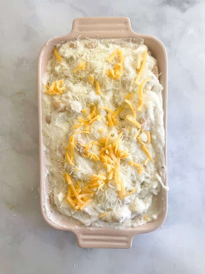 Salty and rich, this cauliflower cheese casserole makes enough for a hearty vegetarian main dish along with a fresh salad. Cheese is added to the top of the casserole.