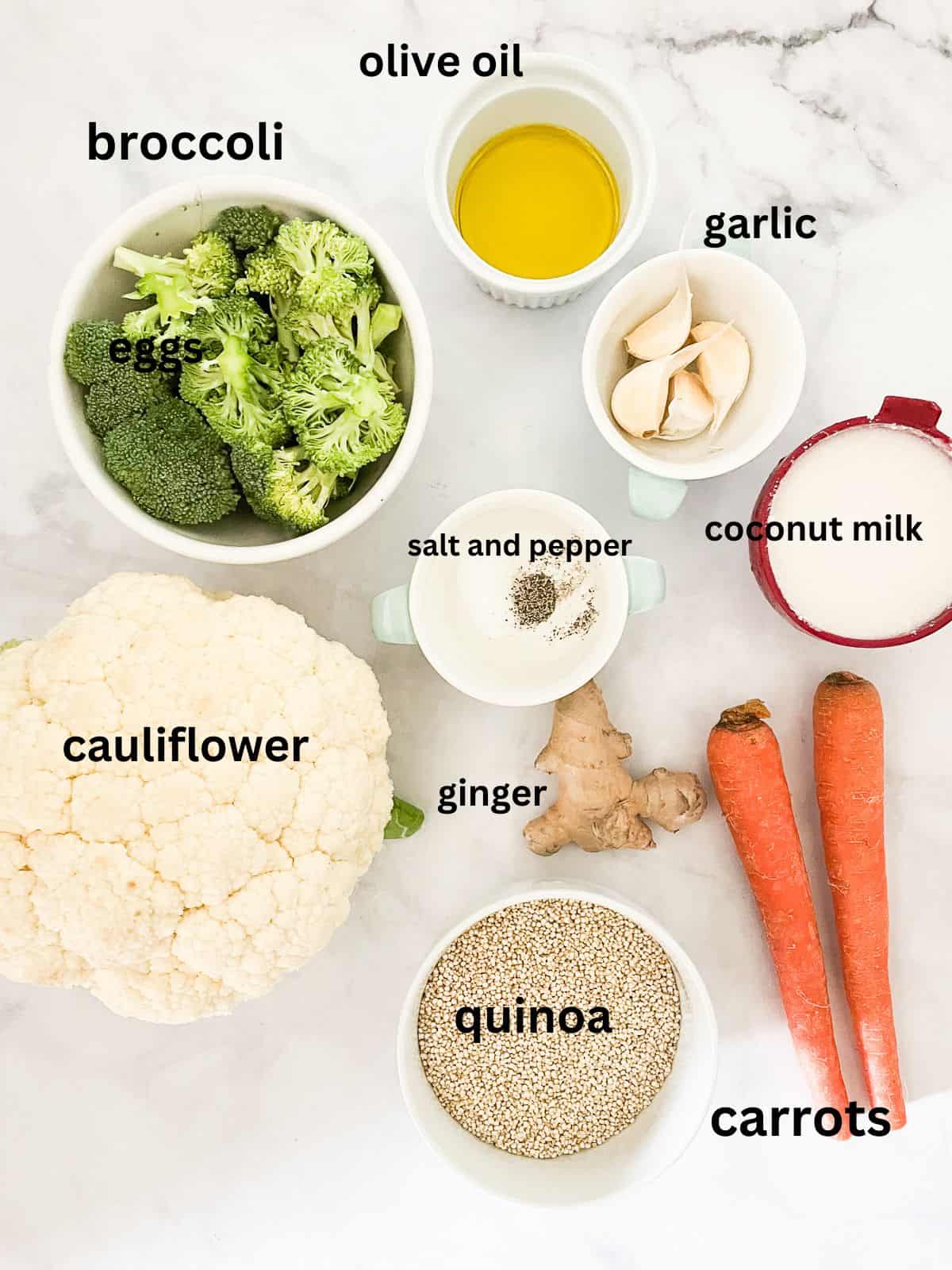 This coconut quinoa with vegetables features coconut-infused, gingery quinoa loaded with carrots, broccoli, and roasted cauliflower. Vegetarian and GF! Ingredients for coconut quinoa are text-labeled.