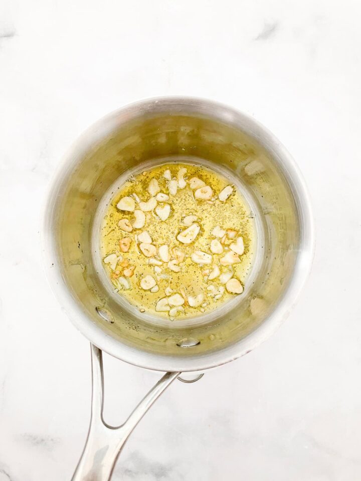 Rich and velvety smooth vegetarian cream of tomato soup is the definition of comfort food-perfect on its own or paired with grilled cheese. Garlic sautees in olive oil in a pot.