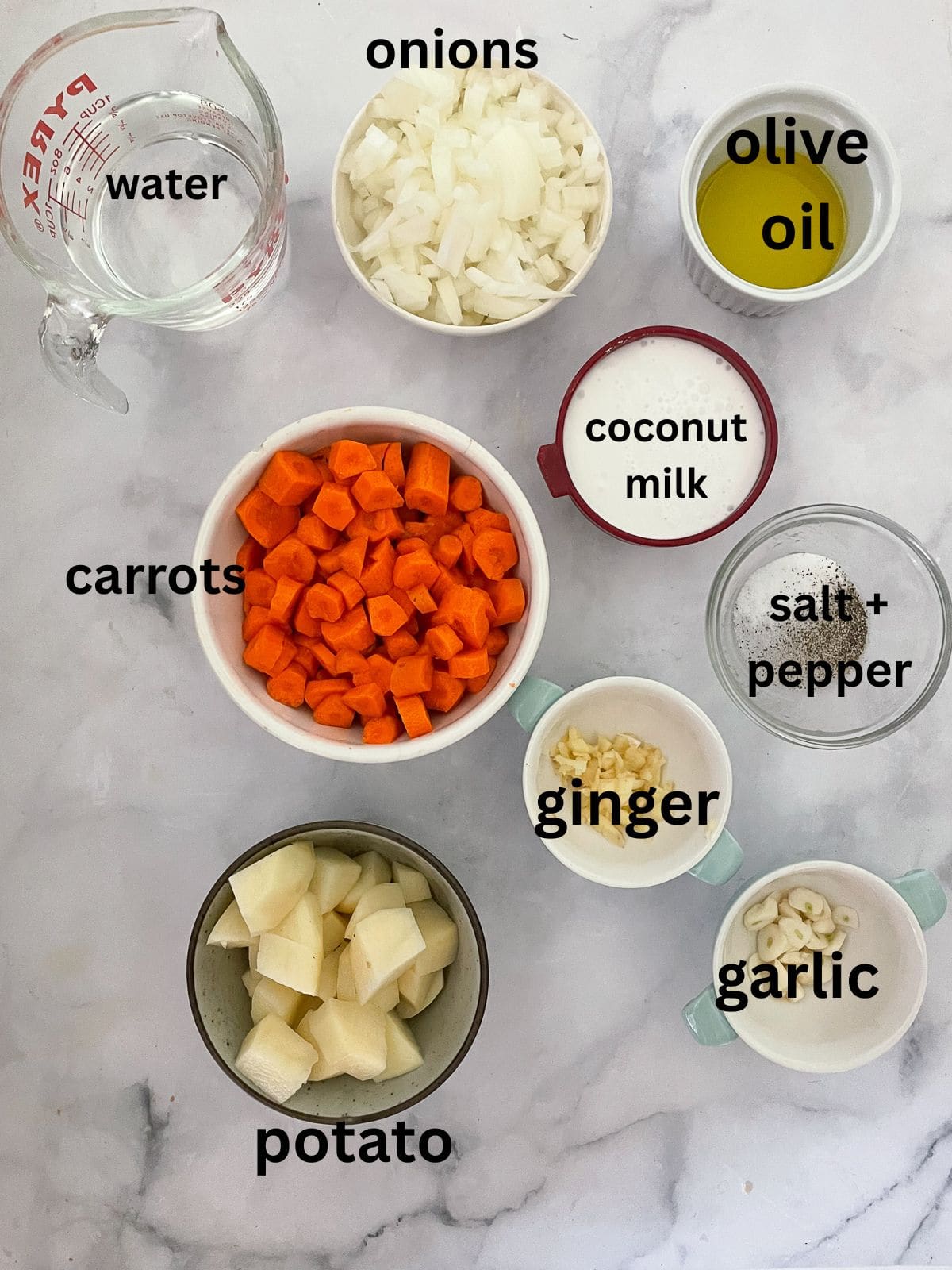 Creamy carrot & coconut soup made with simple ingredients. Naturally vegan, gluten-free, and perfect for weeknight dinners or meal prep. Ingredient for carrot & coconut soup are text-labeled.