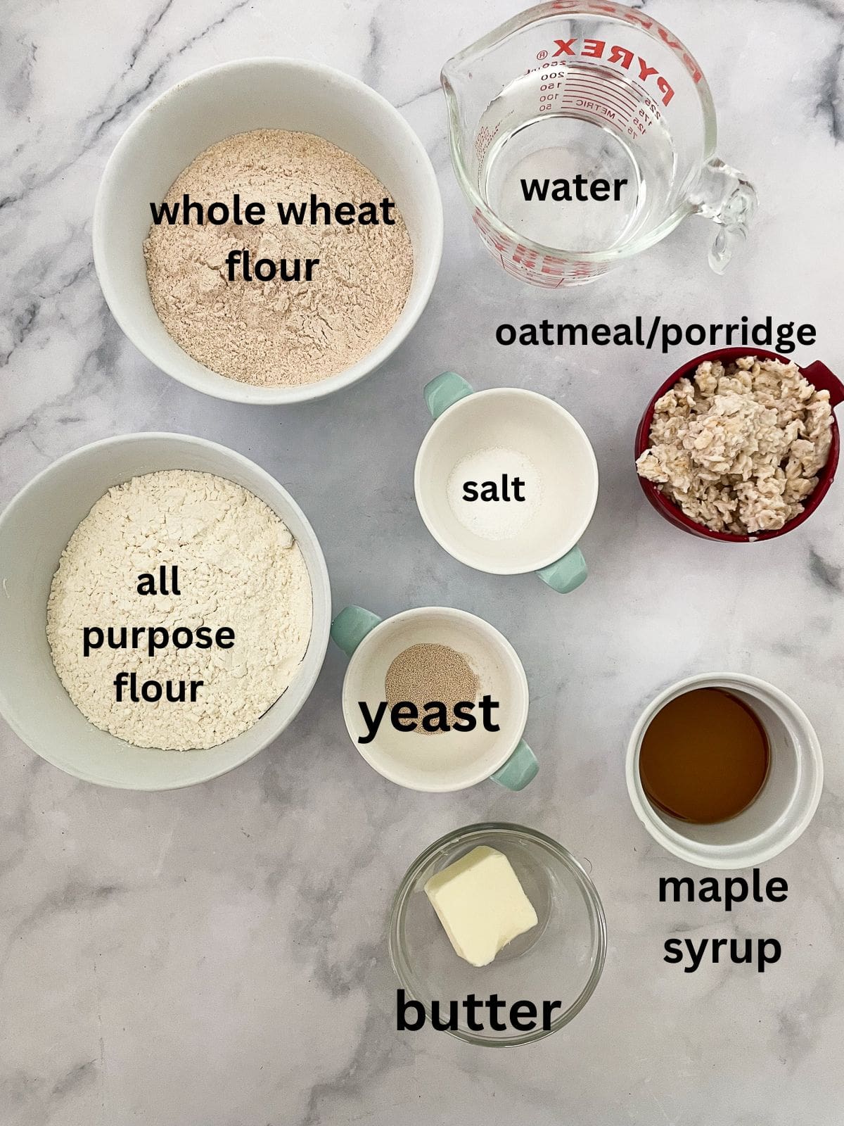 This porridge bread recipe turns leftover oatmeal into a beautifully soft and wholesome loaf! A great way to make sure nothing goes to waste. ingredients for porridge bread are text-labeled.