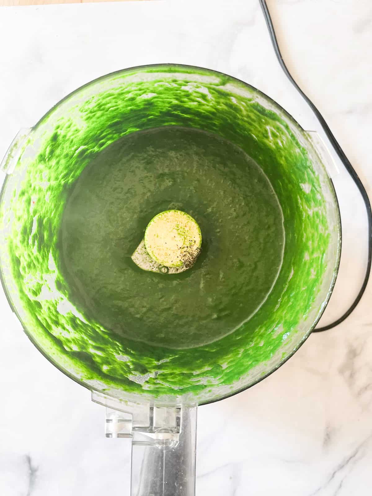 This easy, vegetarian kale pasta sauce is made from garlic sizzled in olive oil, bright green kale, and a bit of lemon zest for extra flavor. Smooth, green kale sauce in a food processor.