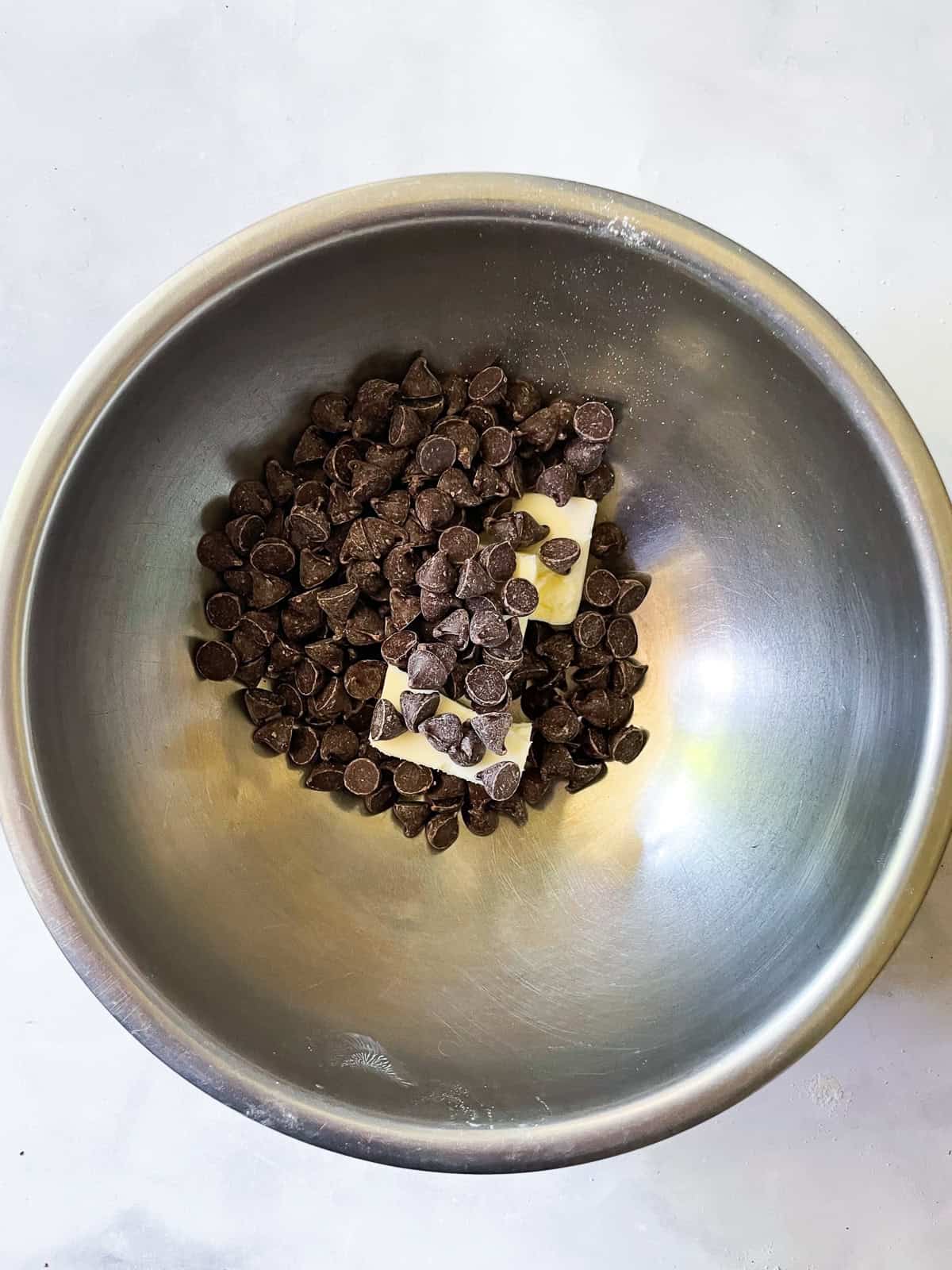 Butter and chocolate are combined for frosting.