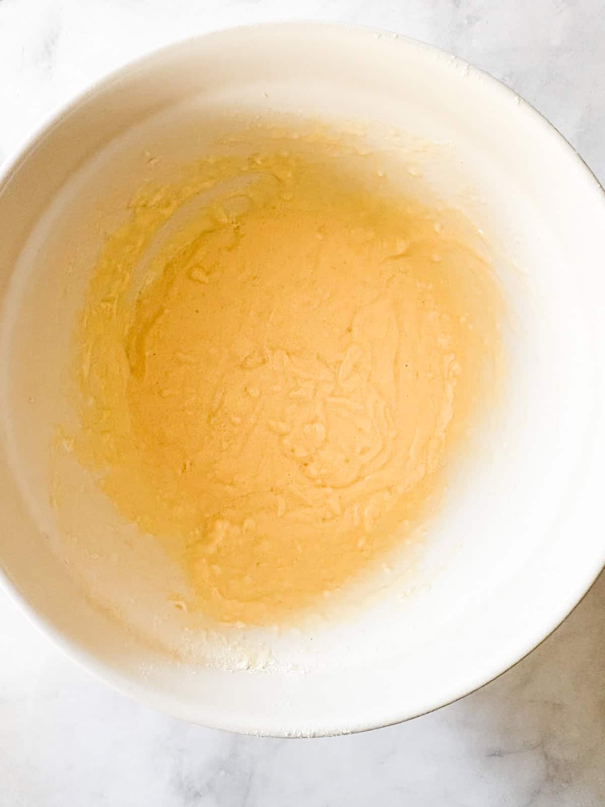 A delicious, lightly sweet homemade cornbread recipe that's made in 1 bowl. Perfect with your favorite soup, stew or chili. Combined batter for homemade cornbread in a bowl.